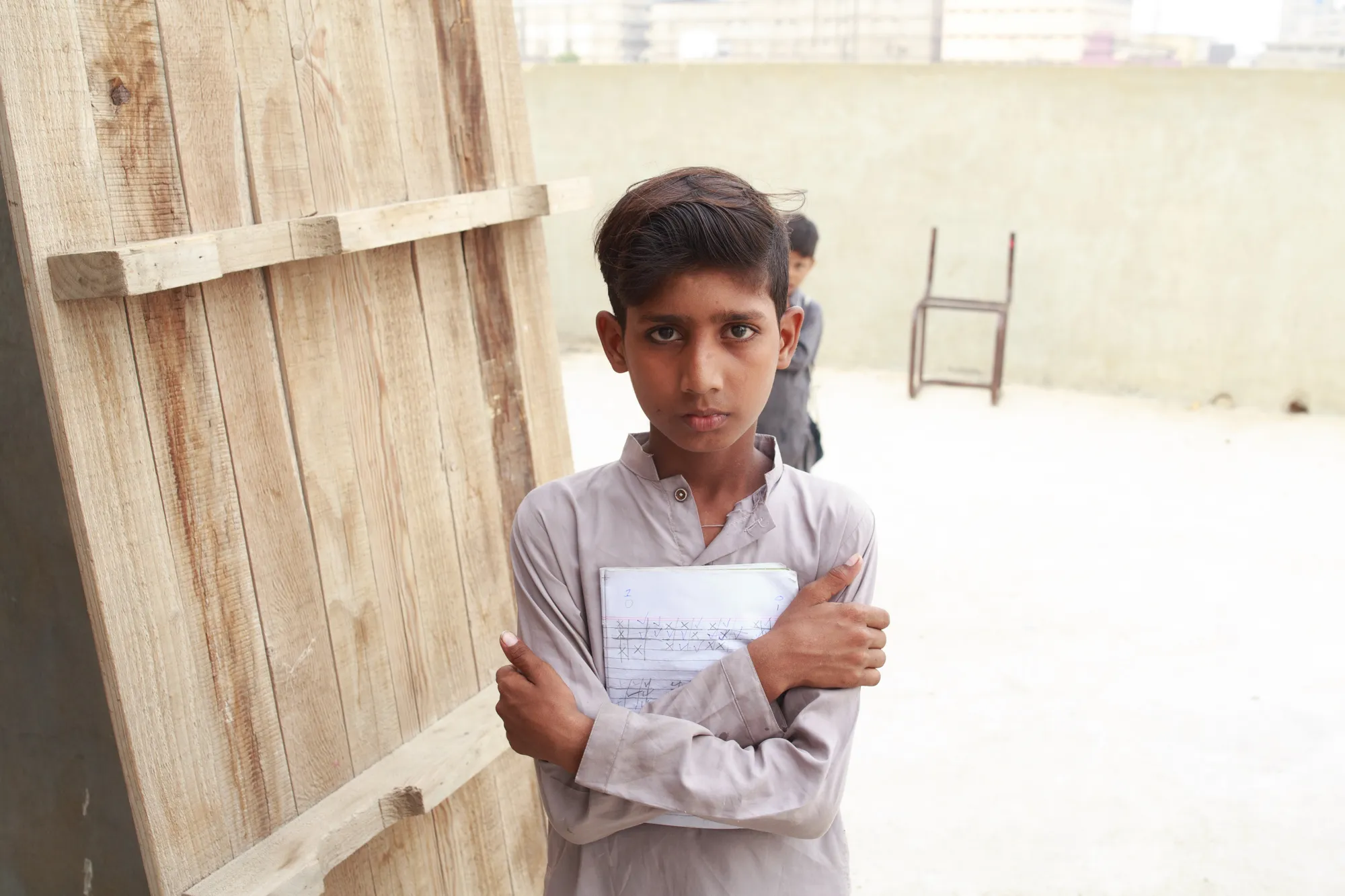 Student hlding a book